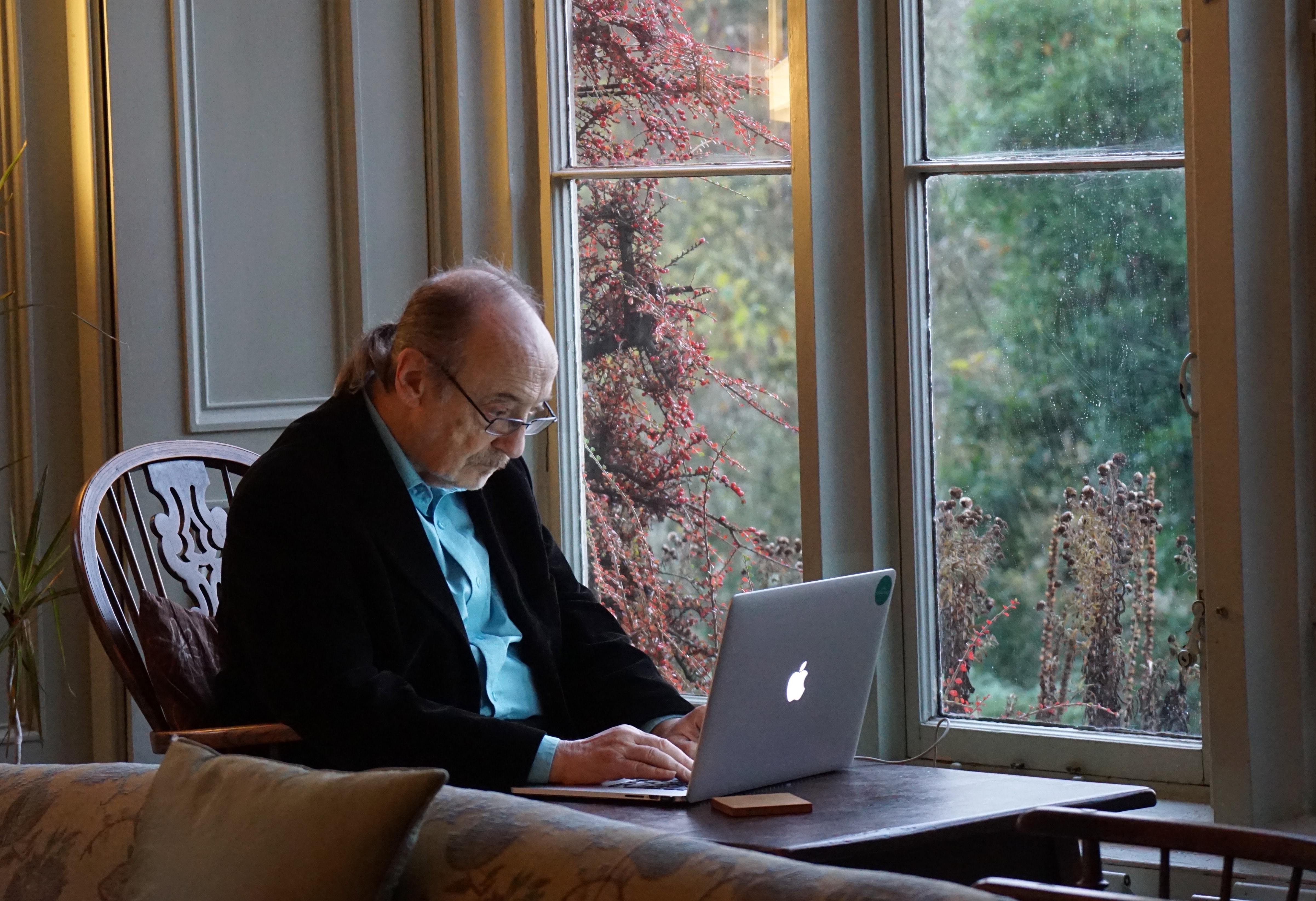Elderly man using computer