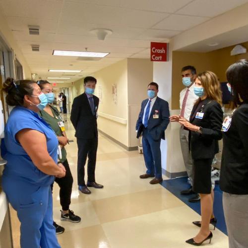 Carrie Owen Plietz with staff at Kaiser Permanente hospital