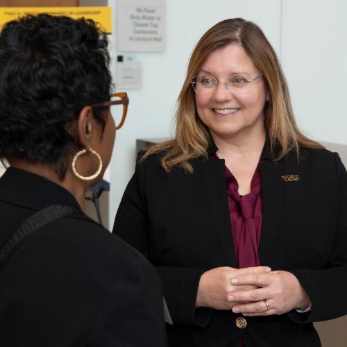 Dean Amy Darragh with a CHP alum