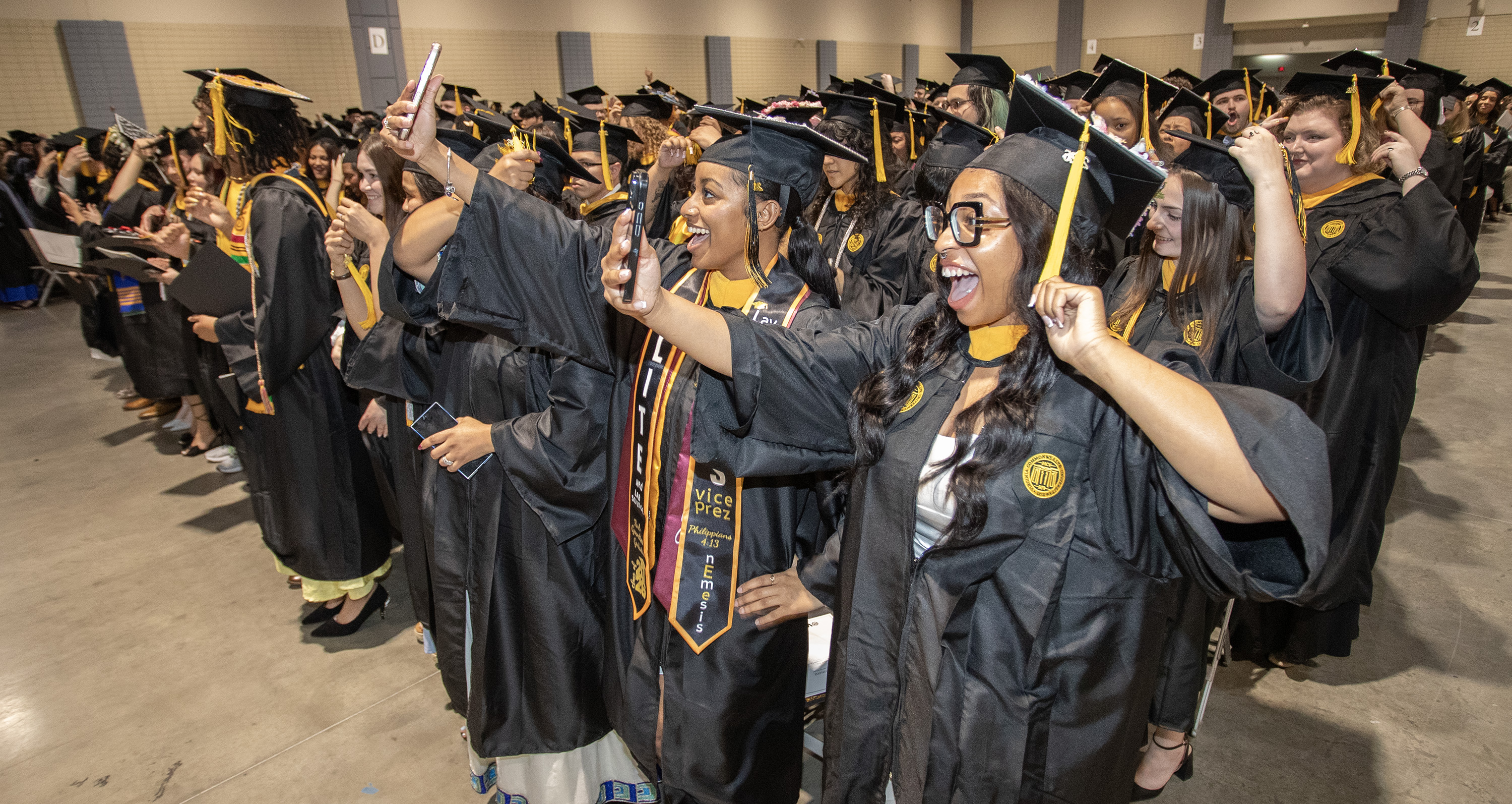 2026 CHP graduates moving their tassels as they officially graduate.