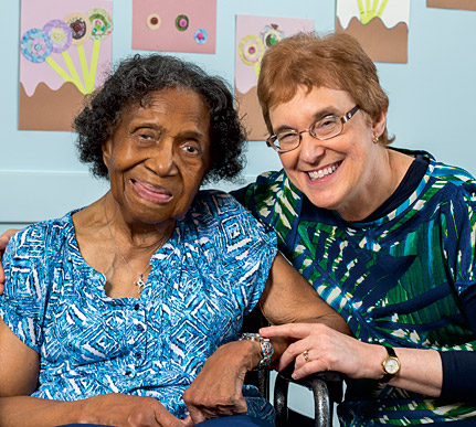 Occupational therapist Sheila Selznick (left) assists longtime client Mary Francis Mathiews at Circle Center Adult Day Services