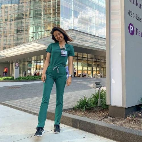 Casey Zhao in front of hospital