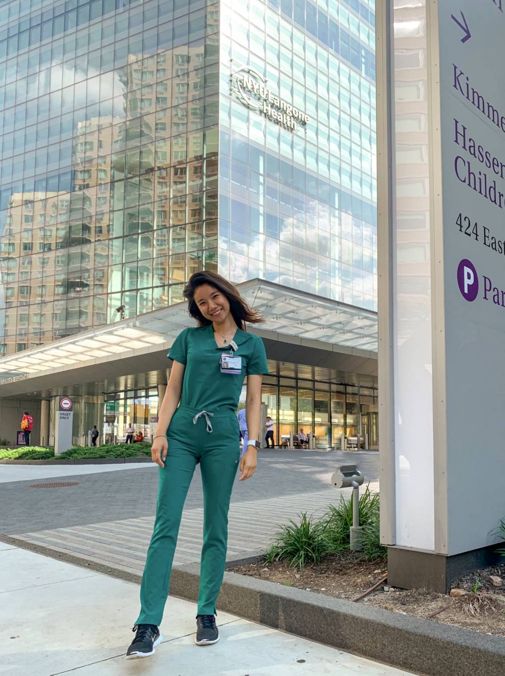 Casey Zhao in front of hospital