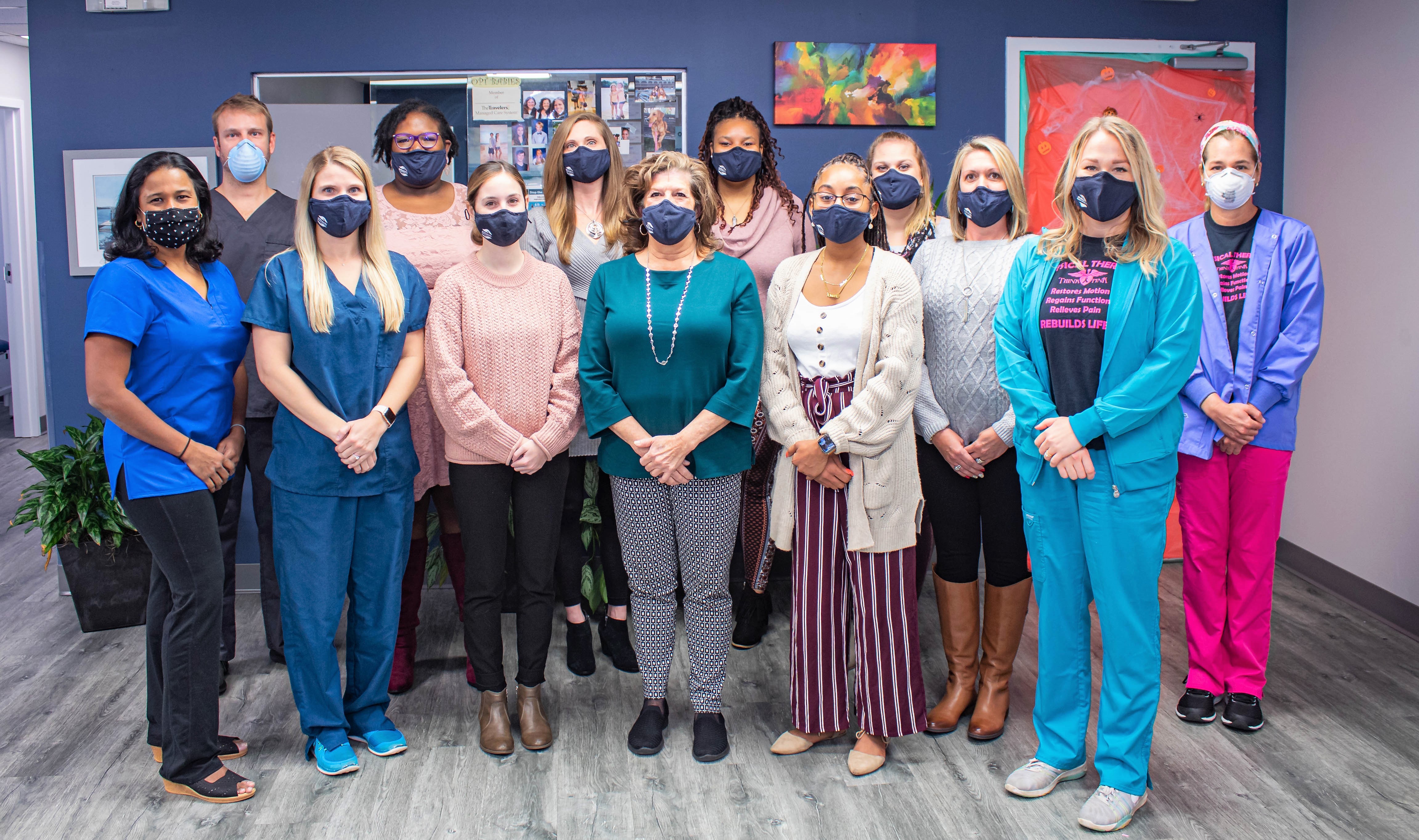 Dr. Adler, center, and her team at Orthopedic Physical Therapy, Inc.