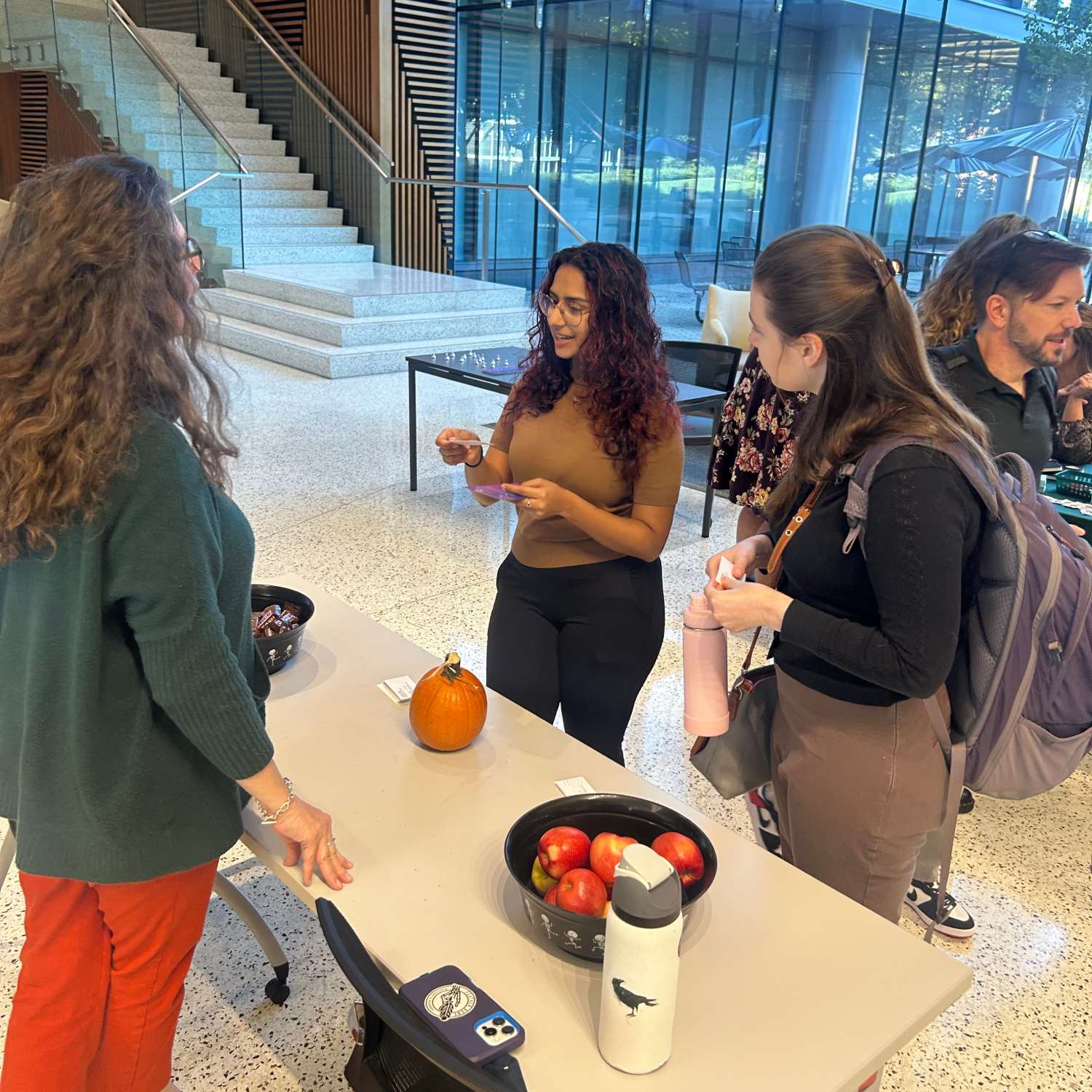 REHAB students visiting a table at the REHAB program agency fair